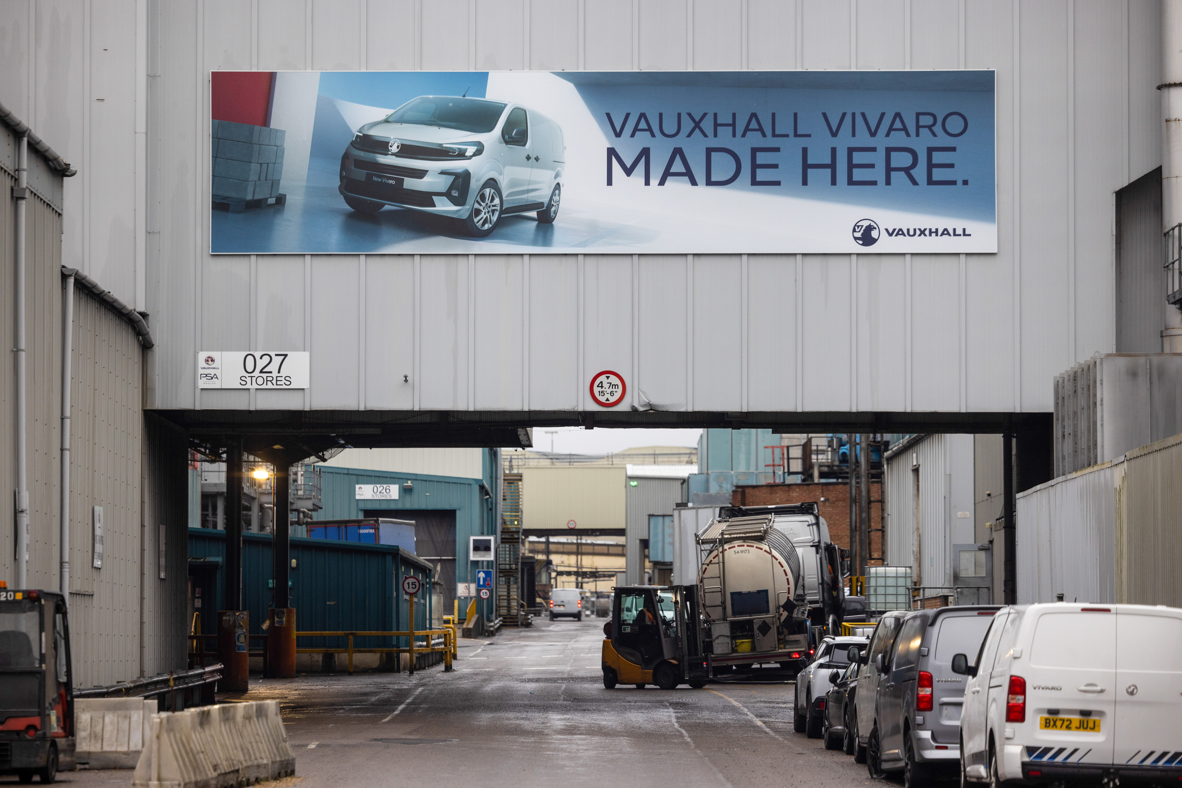 Vauxhall Vivaro van production facility entrance with a billboard highlighting the factory's closure.